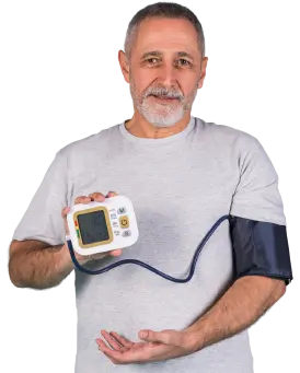 A person holding blood pressure monitoring device
